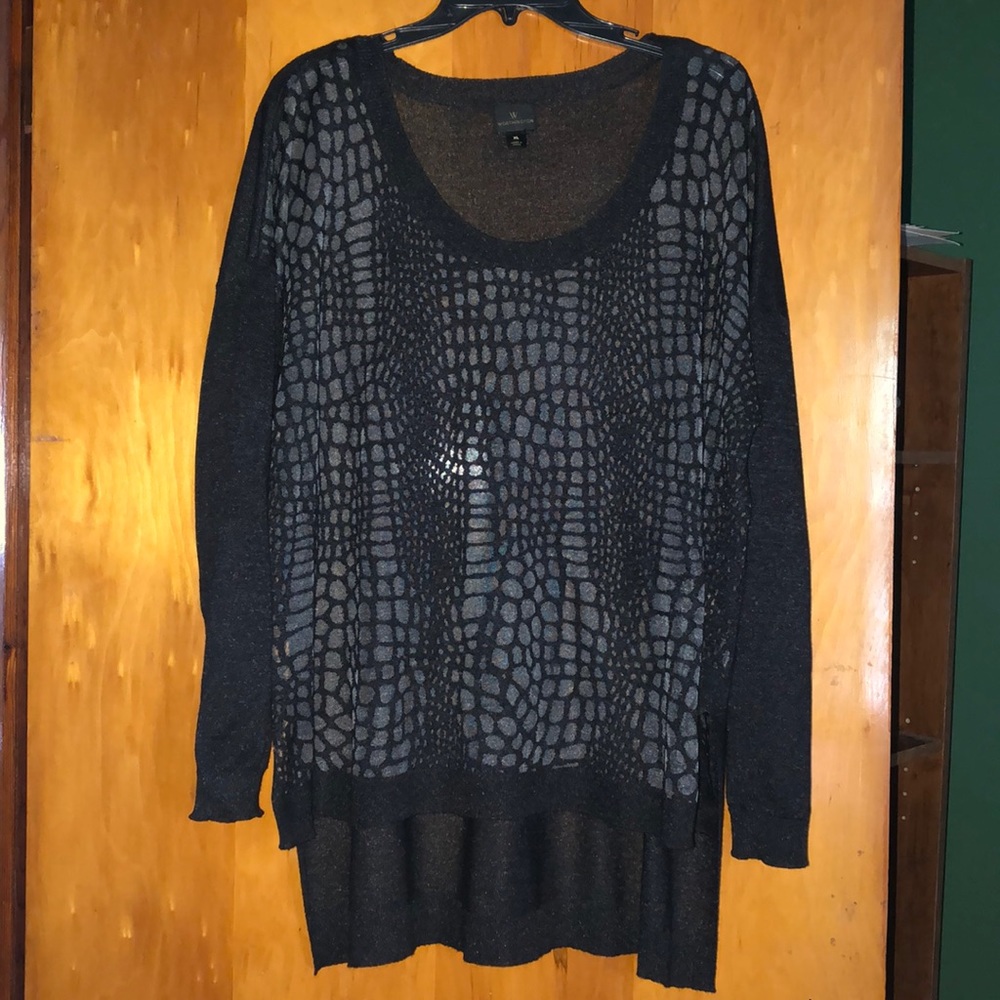Long sleeve lightweight knit top.